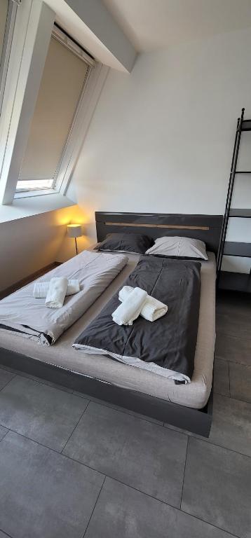 Łóżko lub łóżka w pokoju w obiekcie ToTa Studio