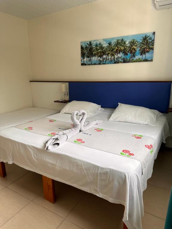Postel nebo postele na pokoji v ubytování Hôtel DOUCE VAGUE