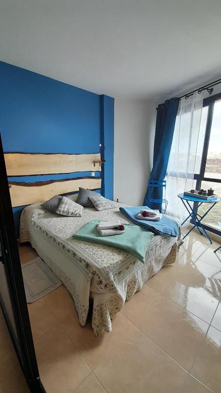 Postel nebo postele na pokoji v ubytování Los Abrigos 2 apartments Guest House Ocean relax, wifi, playas