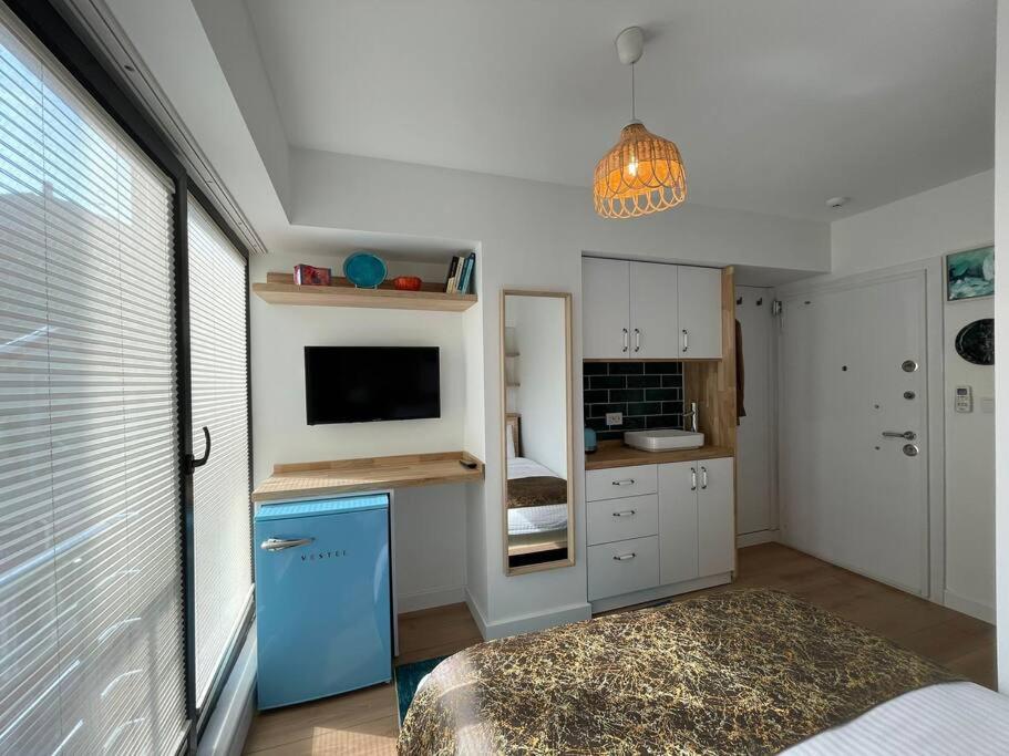 Kuchyň nebo kuchyňský kout v ubytování CLK Suites Hotel