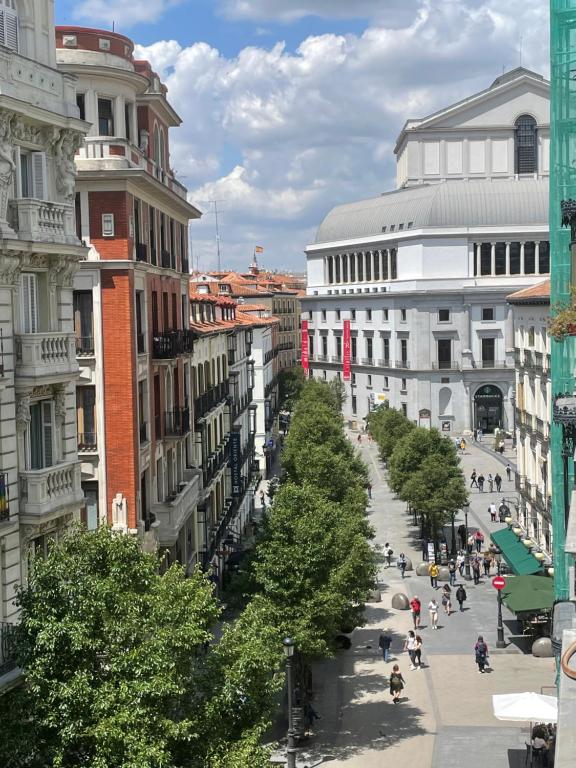 a view of a city street with buildings at Hostal Arenal Madrid in Madrid