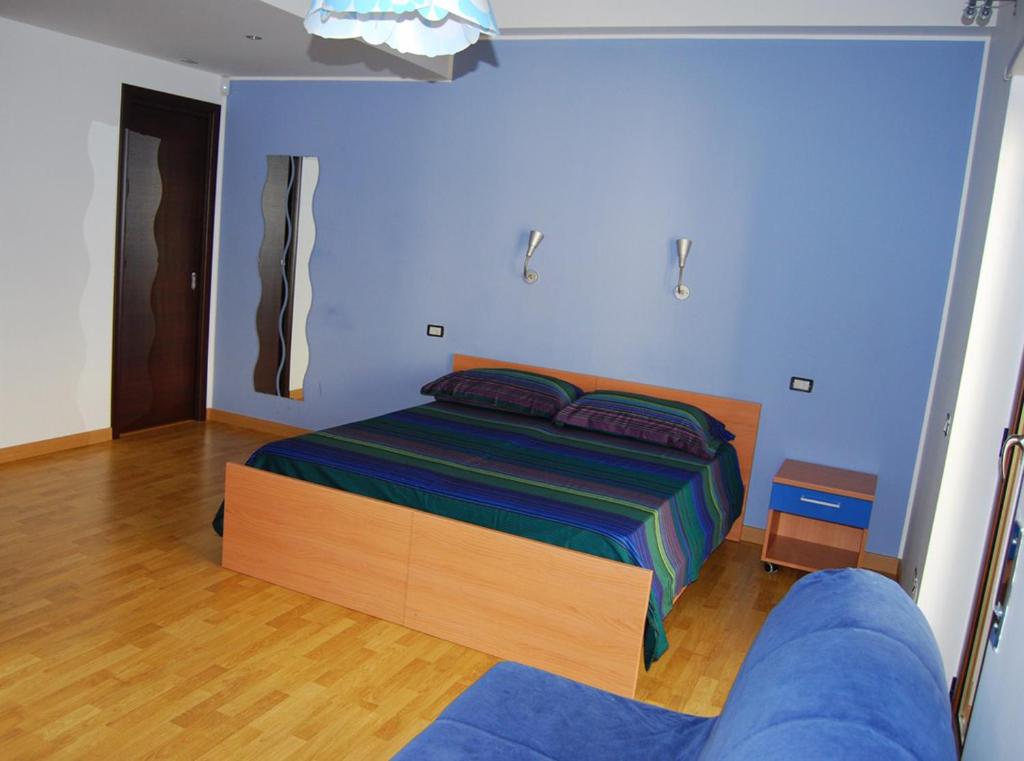 Postel nebo postele na pokoji v ubytování Il Falco e Il Gabbiano