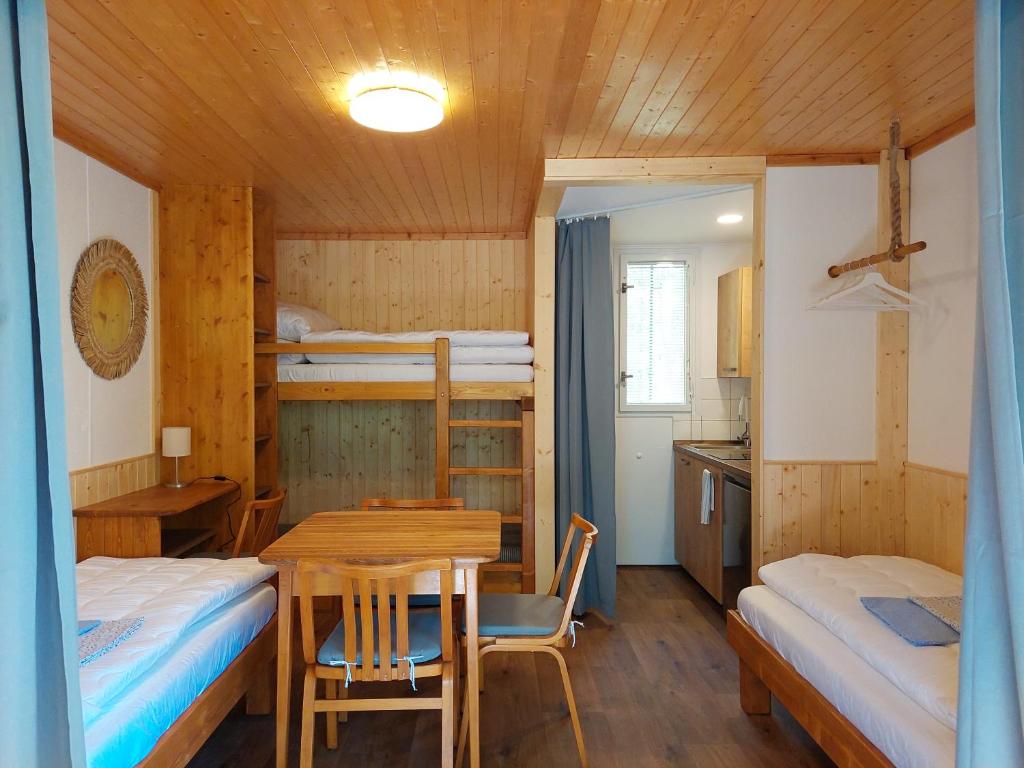 Postel nebo postele na pokoji v ubytování ZÁTOKA Živohošť - Chaty