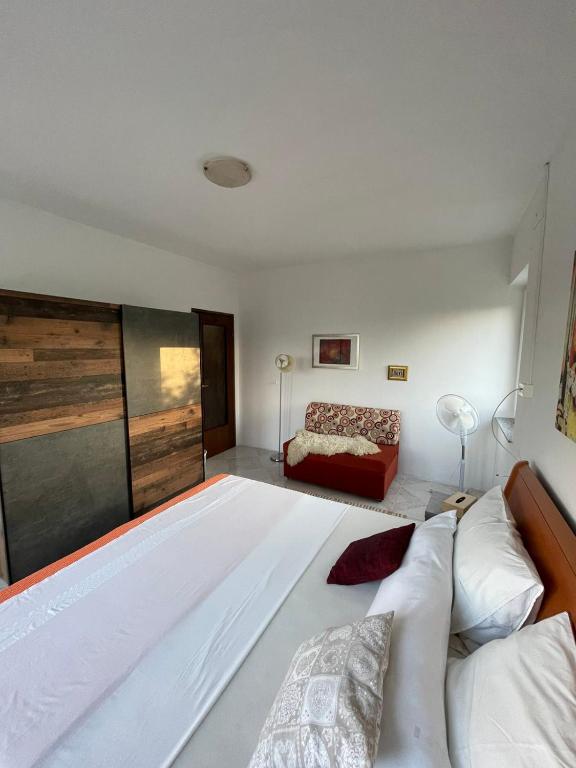 Postel nebo postele na pokoji v ubytování Apartman Kačić