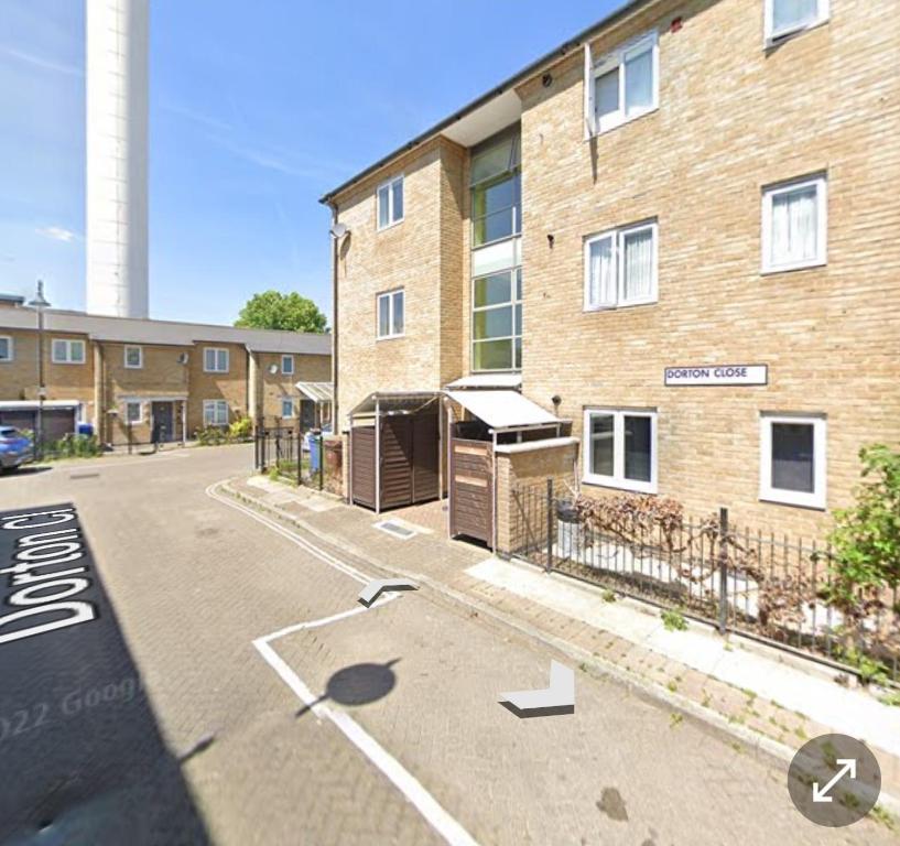 an empty parking lot in front of a brick building at Room in a shared Flat in London