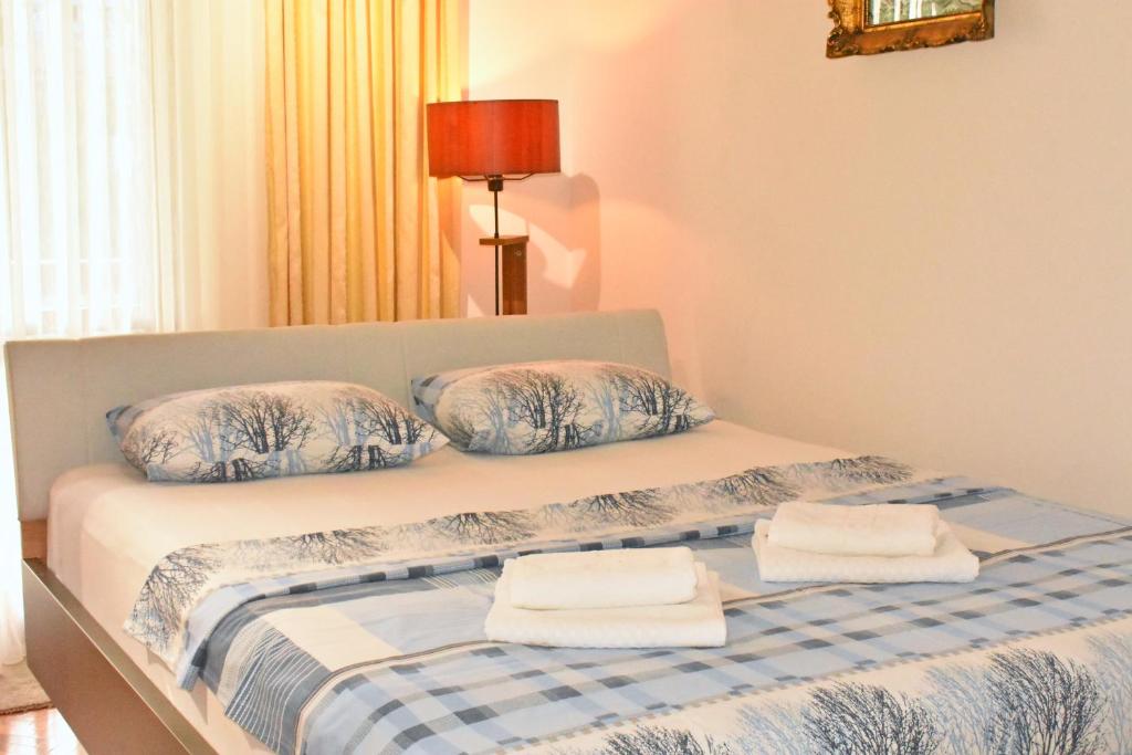 Postel nebo postele na pokoji v ubytování Guesthouse Elsa