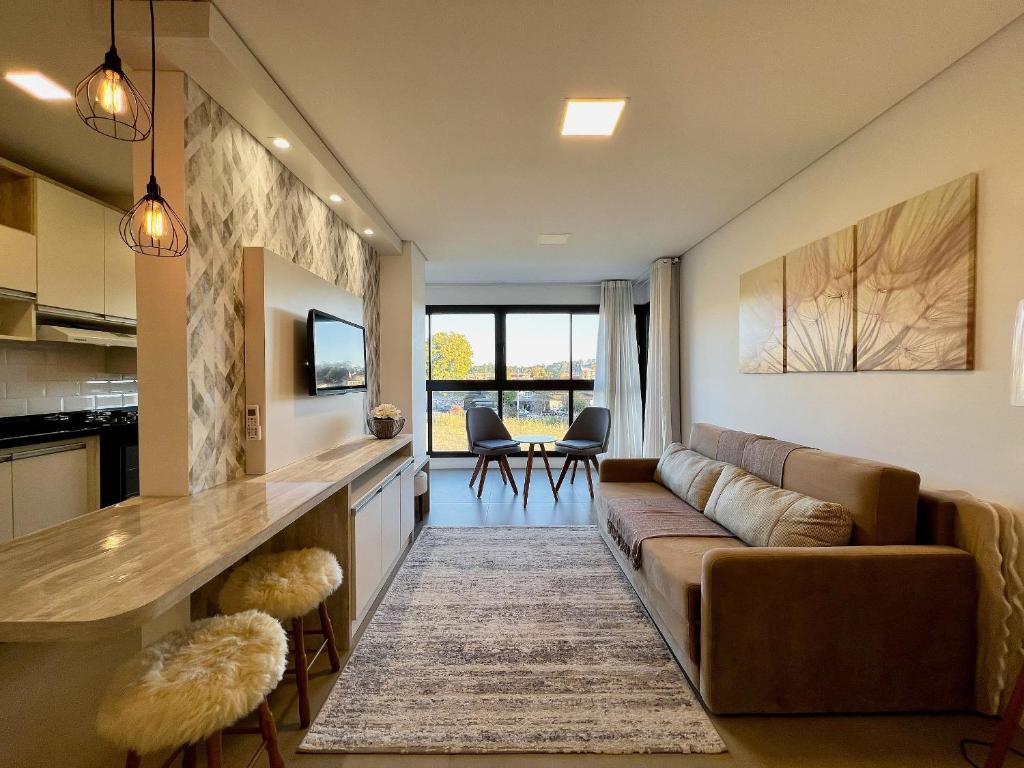 Χώρος καθιστικού στο Apartamento Volo Class 1 dorm Centro by Achei