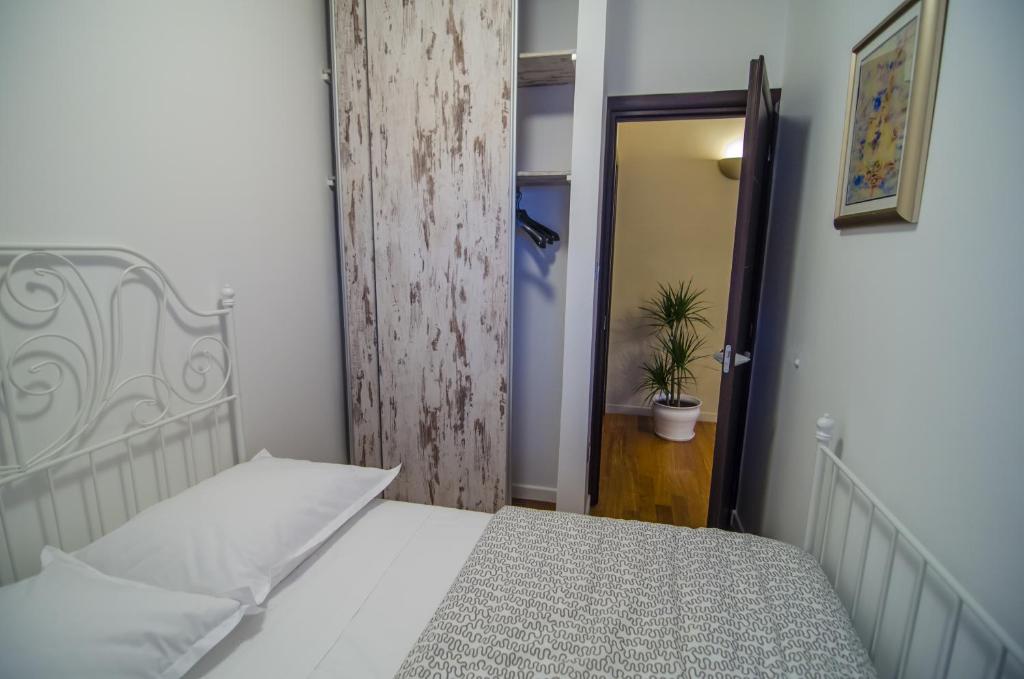 Posteľ alebo postele v izbe v ubytovaní Apartment SAKAL