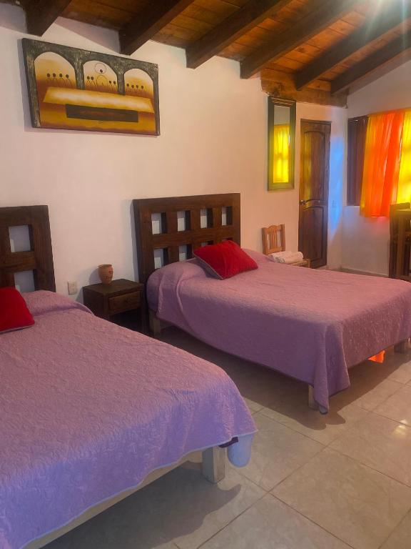 Postel nebo postele na pokoji v ubytování Hotel del Pozo