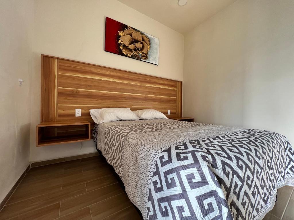 Кровать или кровати в номере Hotel Reforma