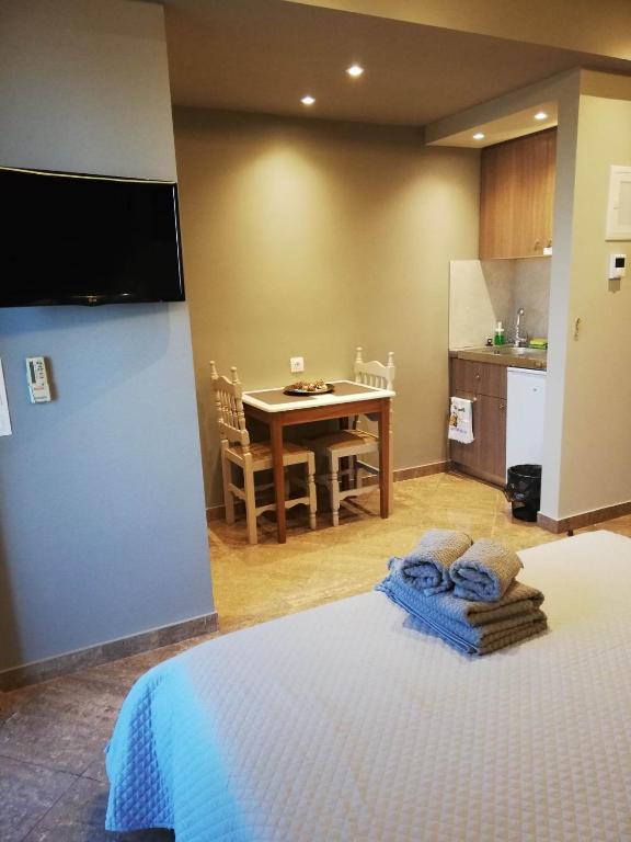 Kuchyň nebo kuchyňský kout v ubytování Maltezos Rooms