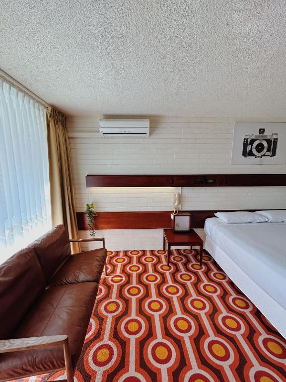 Postel nebo postele na pokoji v ubytování Indian Ocean Hotel