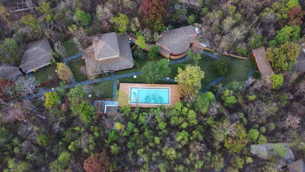 an overhead view of a house in a forest at Saj In The Forest, Pench National Park in Seonī