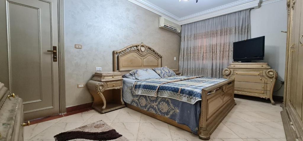 En eller flere senge i et værelse på Comfy 3 Bedrooms Apartment in Cairo 96