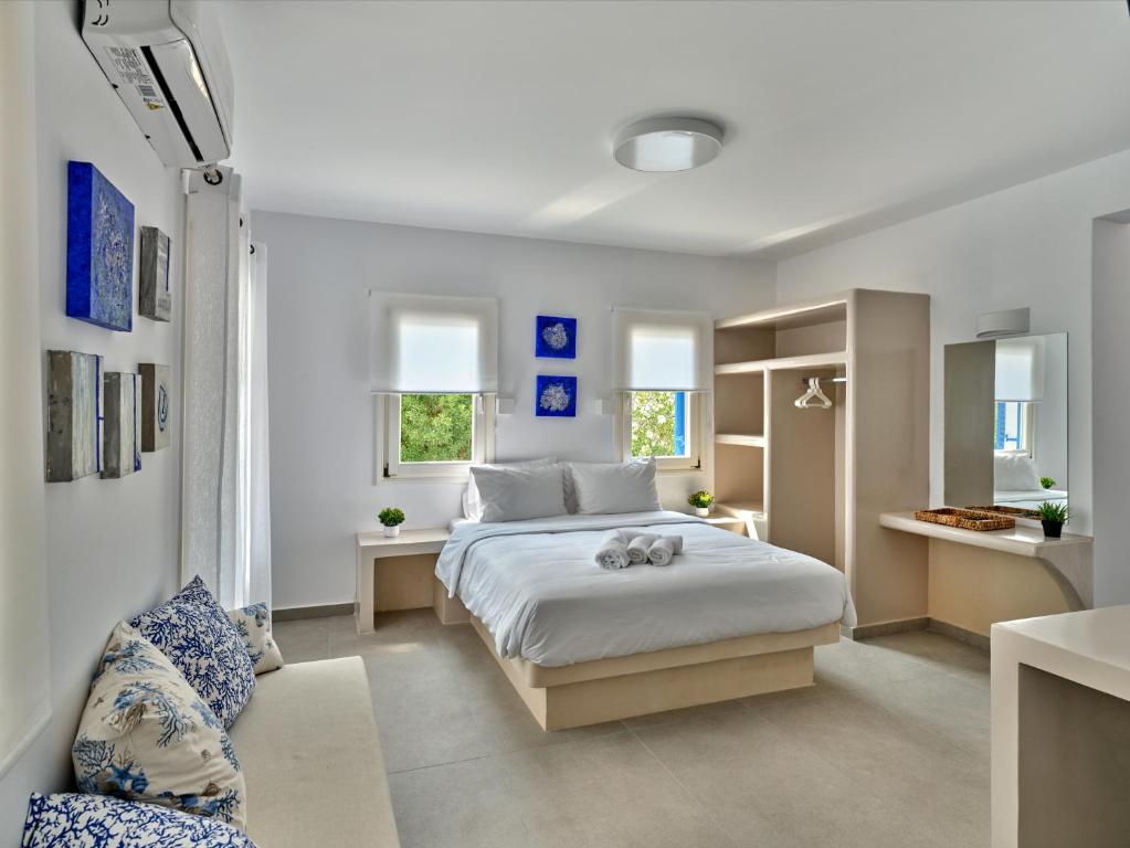 Postel nebo postele na pokoji v ubytování Bedspot Apartments Paros