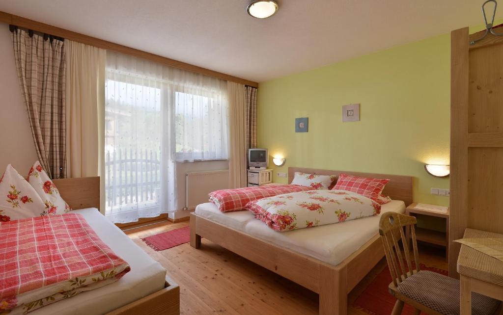 Posteľ alebo postele v izbe v ubytovaní Ferienhaus Siglinde