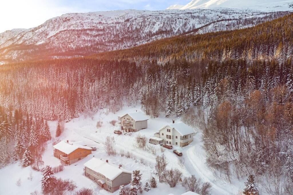 an aerial view of a house in the snow at Main floor in the Lyngen Alps, whole house rentable in Lyngseidet