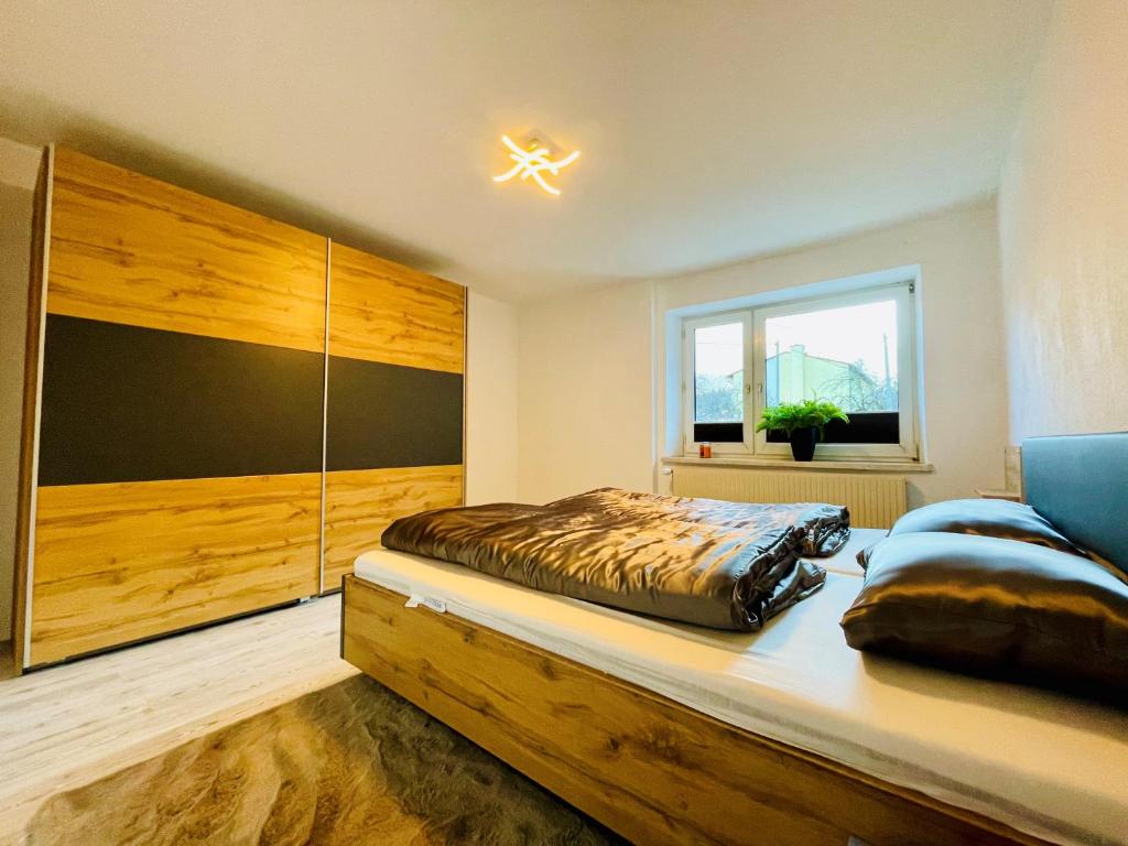 Postel nebo postele na pokoji v ubytování Ferienwohnung Bosruckblick