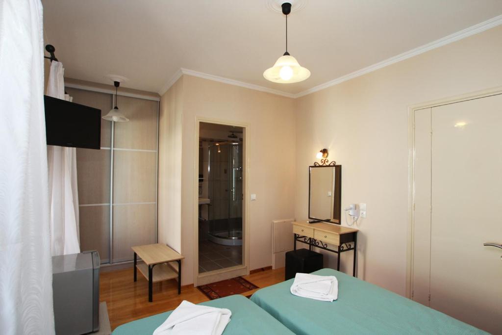 Postel nebo postele na pokoji v ubytování Lefcothea Guest Rooms