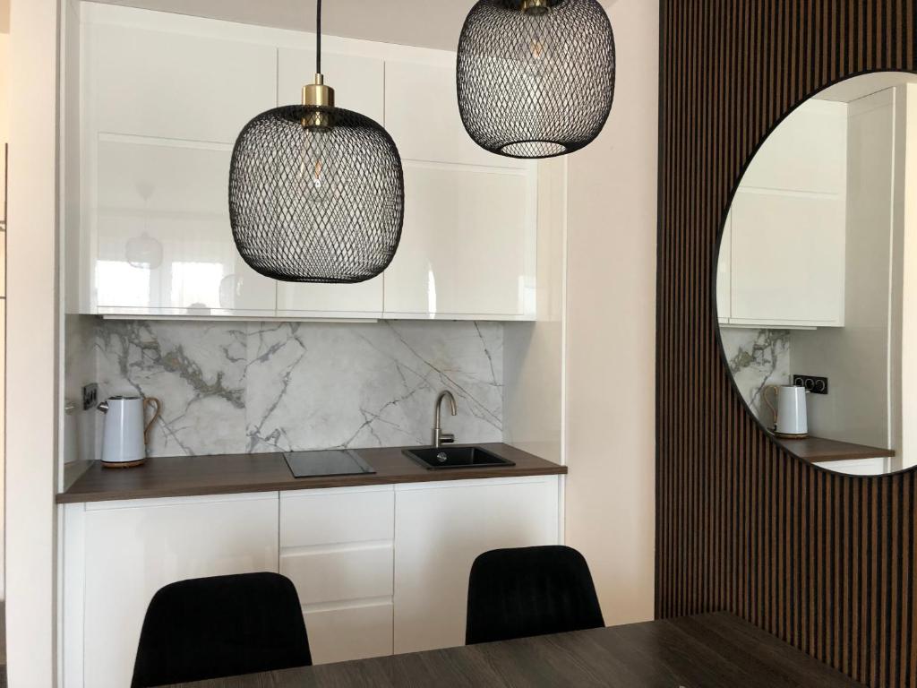 WILLA MAGNOLIA - Apartamenty i Pokoje SPRZĘT DO POŁAWIANIA BURSZTYNU -wodery, podbieraki, latarki UV - POKÓJ ZABAW- ROWERY - KAWA Z EKSPRESU - 8