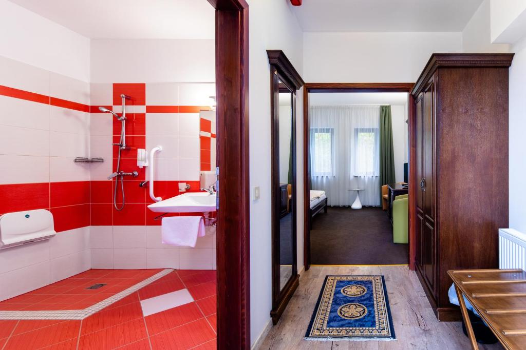 Postel nebo postele na pokoji v ubytování Hotel Vécsecity