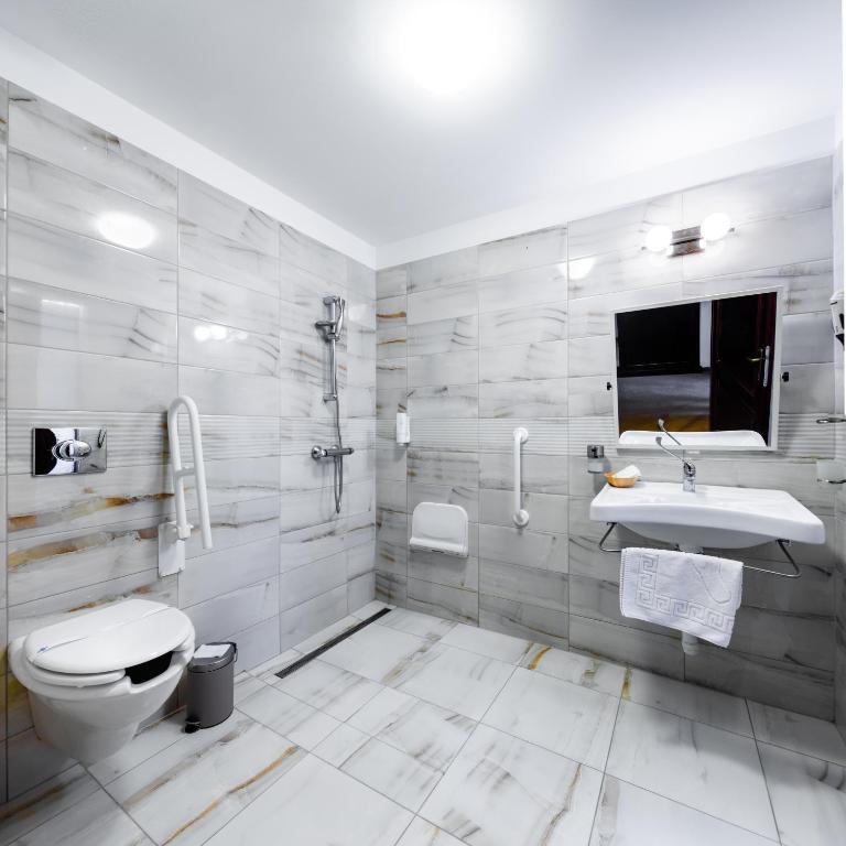 Koupelna v ubytování Hotel Vécsecity