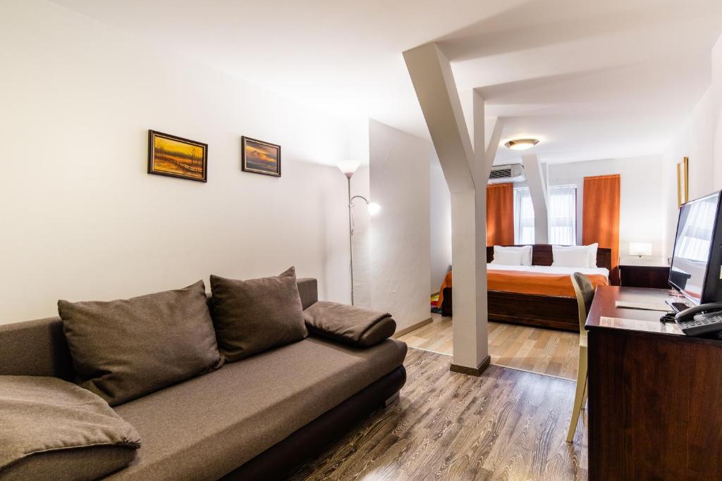 Postel nebo postele na pokoji v ubytování Hotel Vécsecity