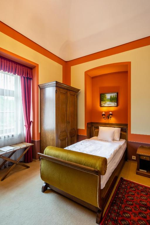 Postel nebo postele na pokoji v ubytování Hotel Vécsecity
