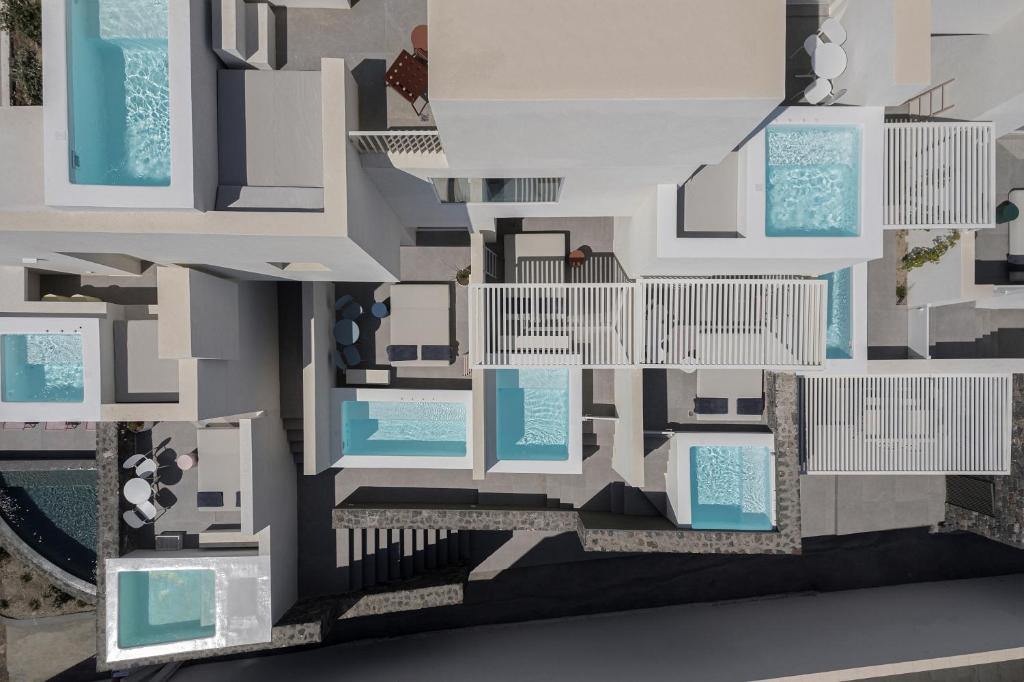 a rendering of a building with white and blue at Neo Suites in Fira