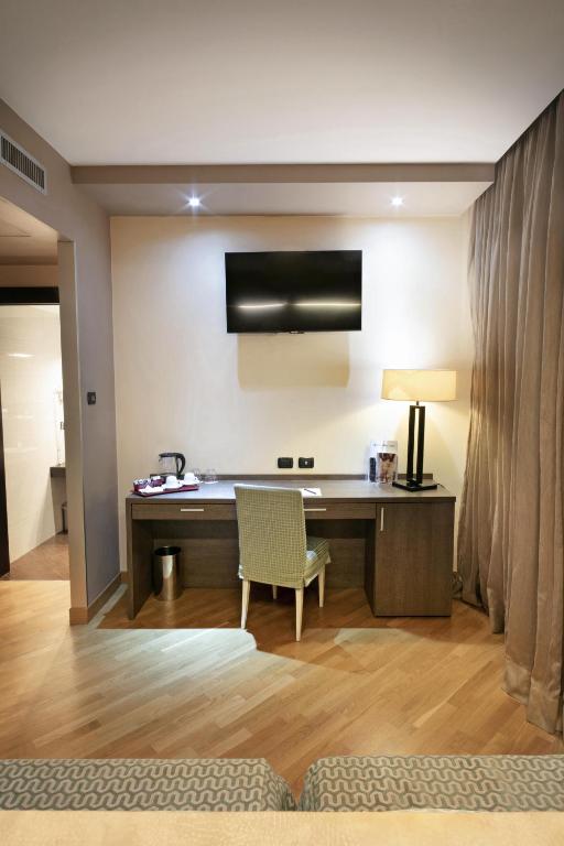 TV a/nebo společenská místnost v ubytování Hotel & Spa Villa Mercede