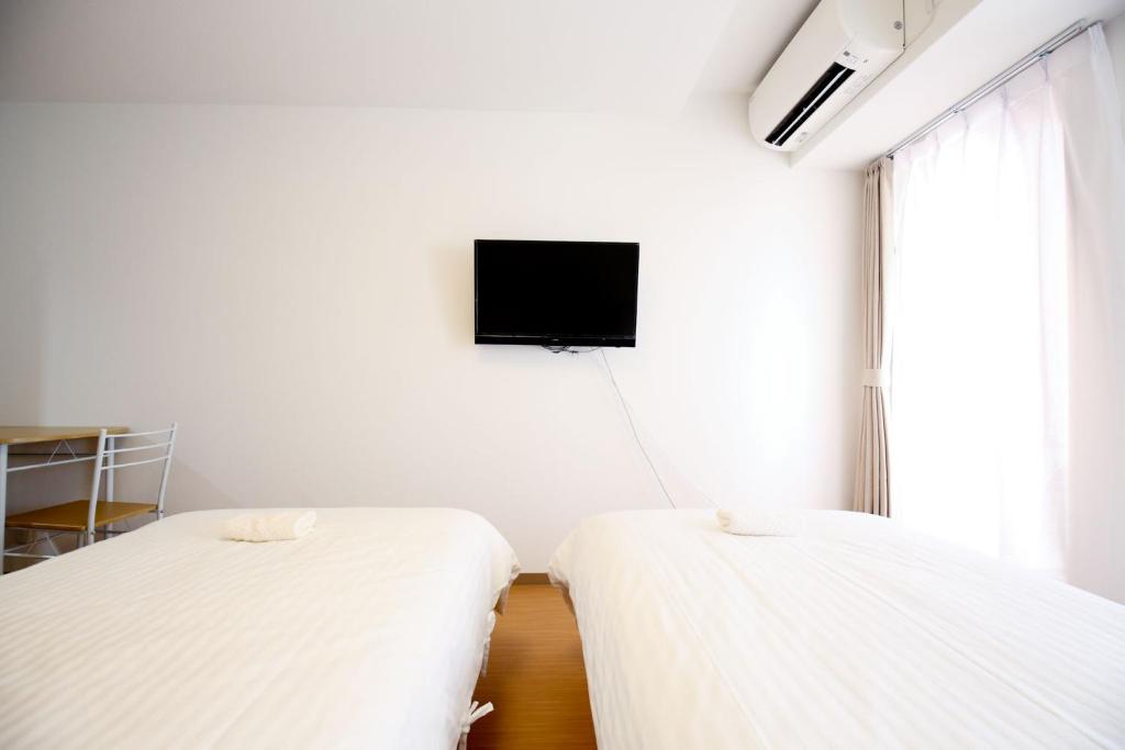 Connect Inn - Standard Twin Room With Shared Bathroom