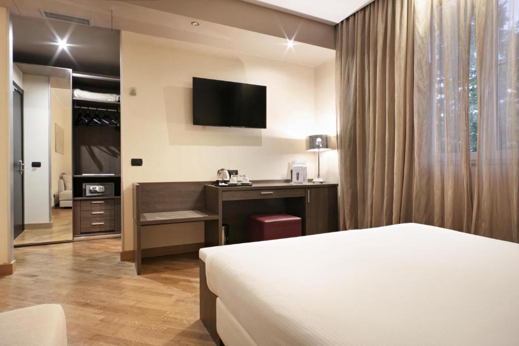 Postel nebo postele na pokoji v ubytování Hotel & Spa Villa Mercede