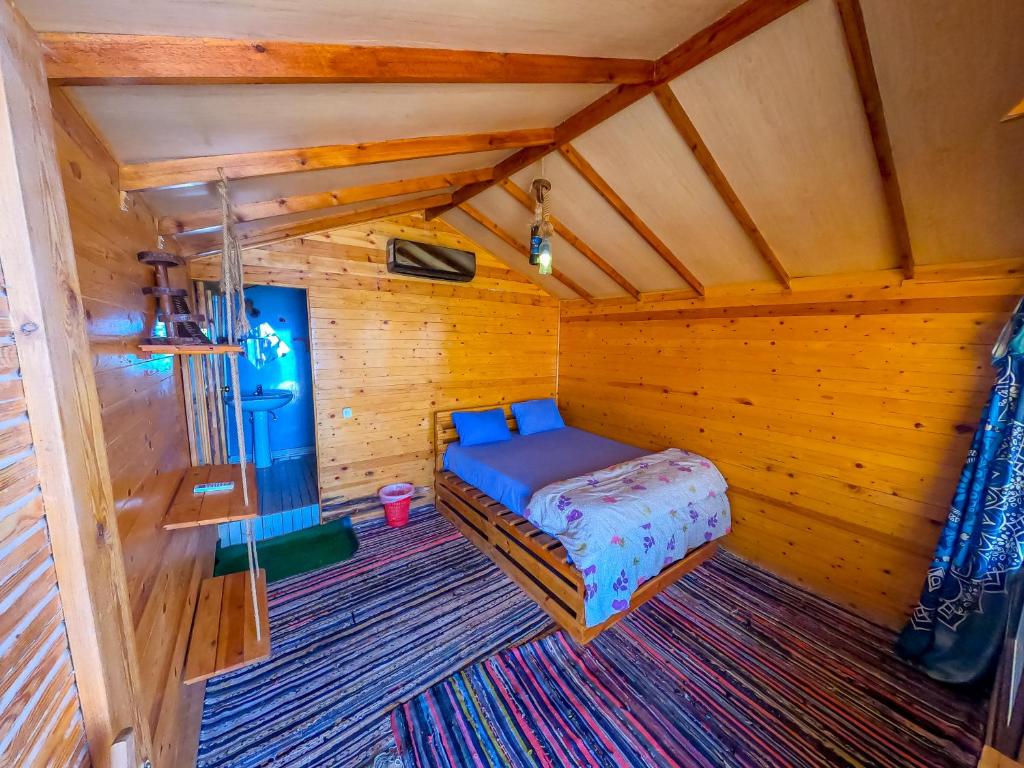 Postel nebo postele na pokoji v ubytování Baraka Camp