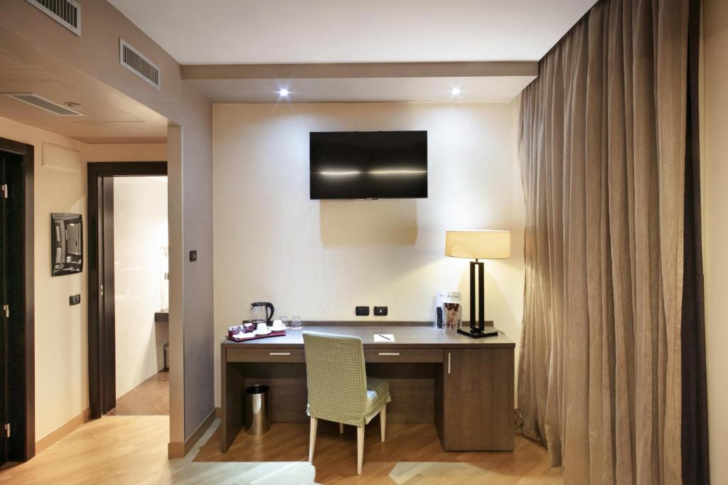 TV a/nebo společenská místnost v ubytování Hotel & Spa Villa Mercede