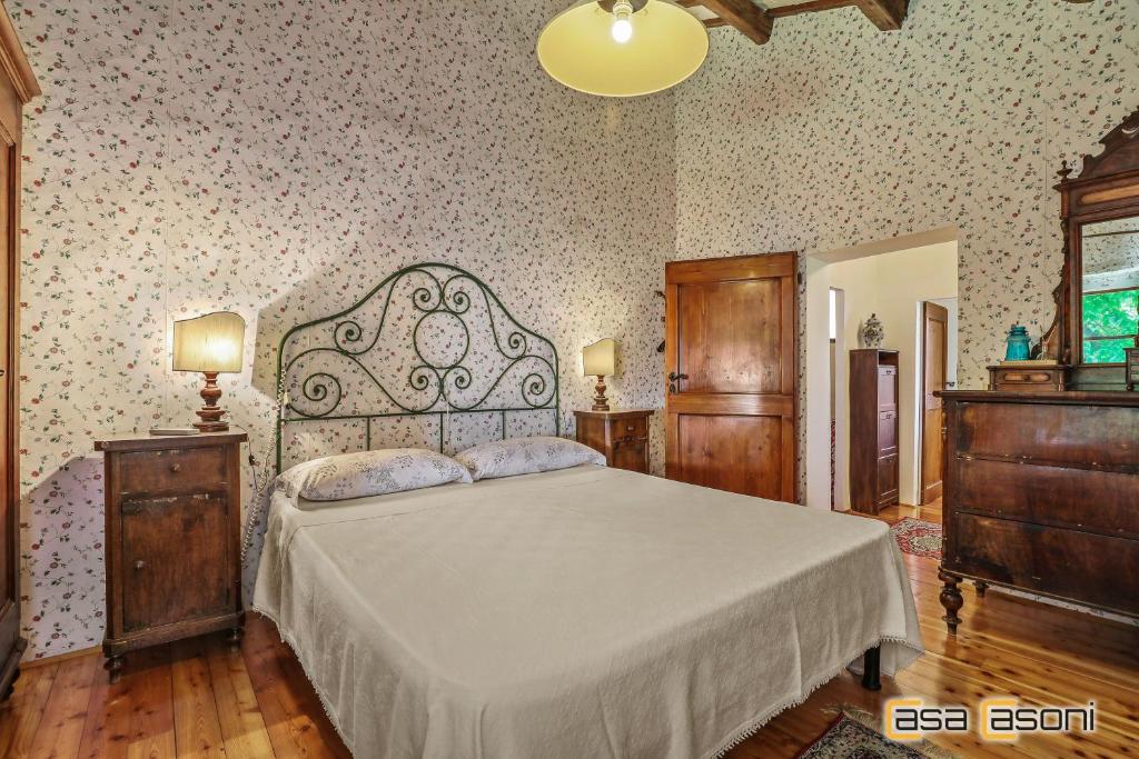 Casa dei Pini Country House tesisinde bir odada yatak veya yataklar