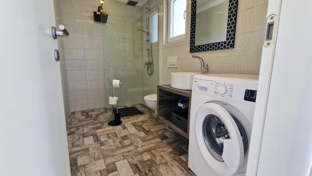 Kúpeľňa v ubytovaní Apartments Brajde