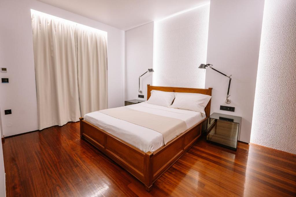 Łóżko lub łóżka w pokoju w obiekcie BlueGreen Villa