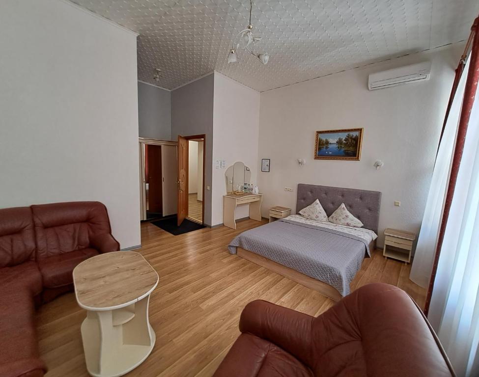 Postel nebo postele na pokoji v ubytování Saules rati