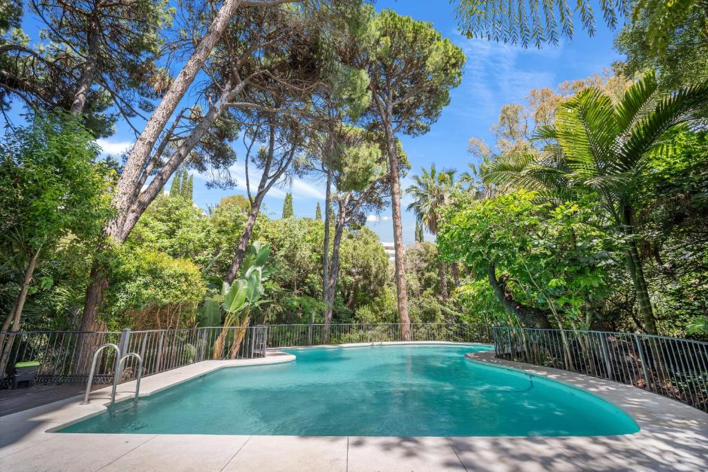 Bazén v ubytování Jardin Del Mediterraneo nebo v jeho okolí