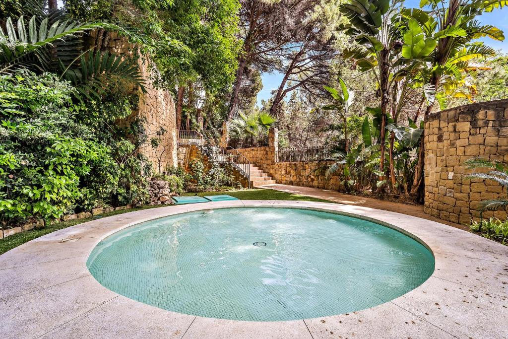 Bazén v ubytování Jardin Del Mediterraneo nebo v jeho okolí