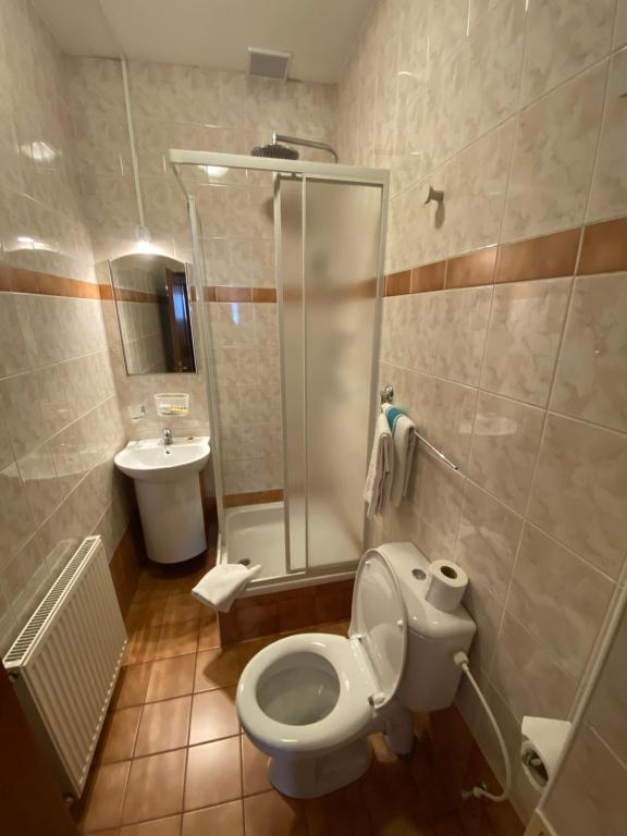 Koupelna v ubytování Penzión TATRA INN