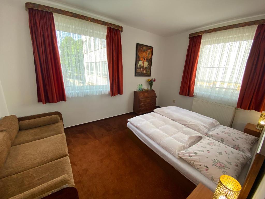 Postel nebo postele na pokoji v ubytování Penzión TATRA INN
