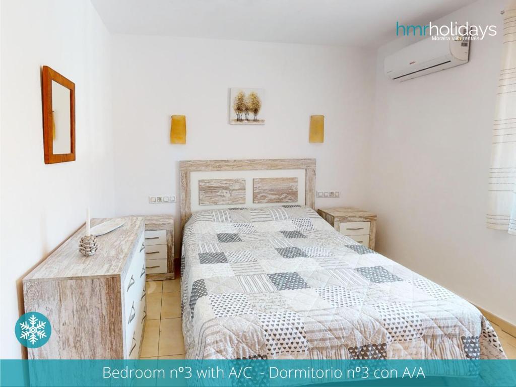 Postel nebo postele na pokoji v ubytování Villa Portina by HMR Holidays