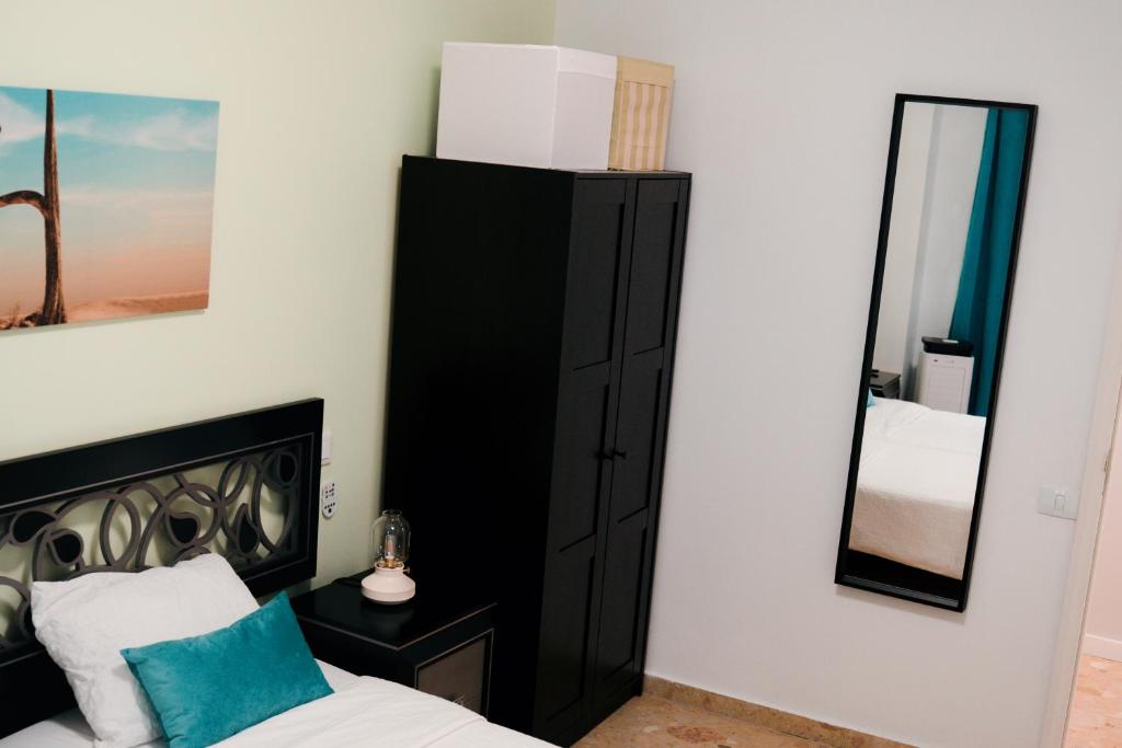Postel nebo postele na pokoji v ubytování Resort Suites Vecindario