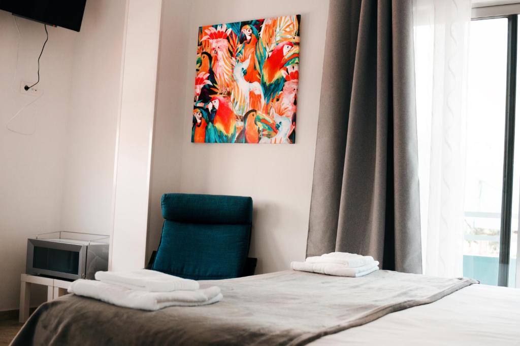Postel nebo postele na pokoji v ubytování Resort Suites Vecindario