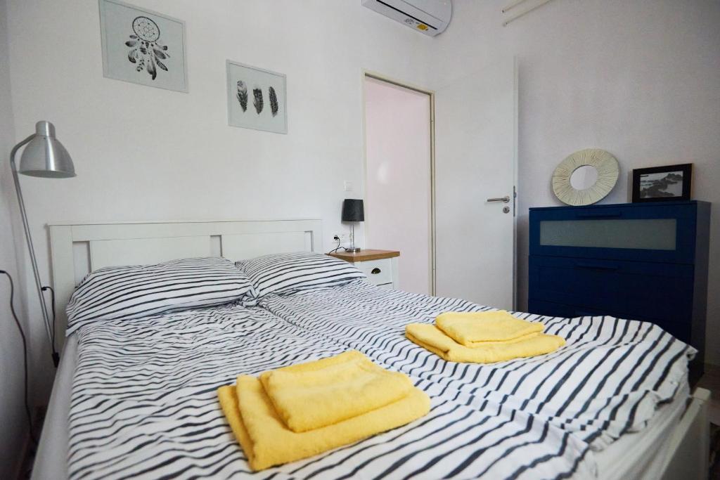 Postel nebo postele na pokoji v ubytování Piccoleto Bianco