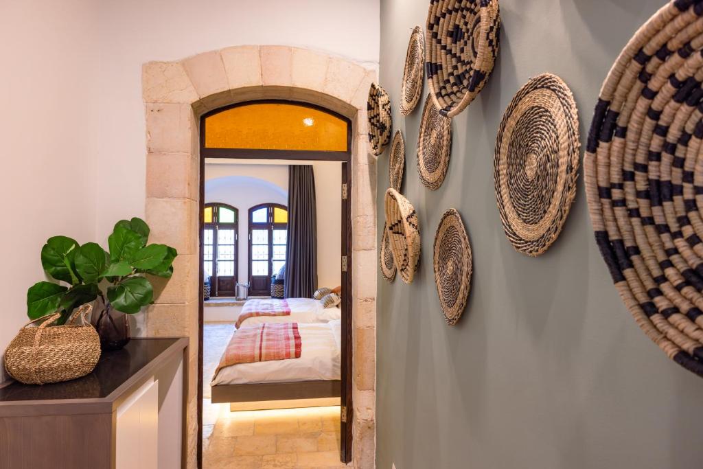 Postel nebo postele na pokoji v ubytování Kassa Boutique Hotel