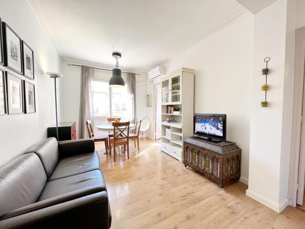 TV a/nebo společenská místnost v ubytování Casa Sagrada Familia