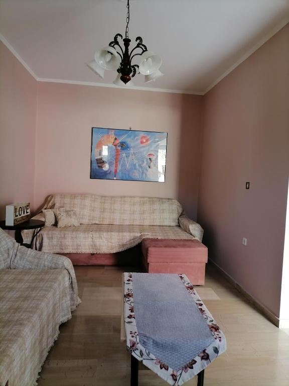 Postel nebo postele na pokoji v ubytování flower garden apartment