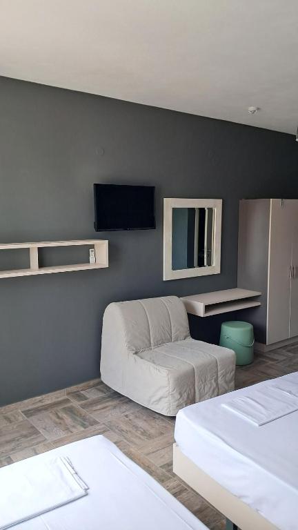 Postel nebo postele na pokoji v ubytování Boutique Pelayo